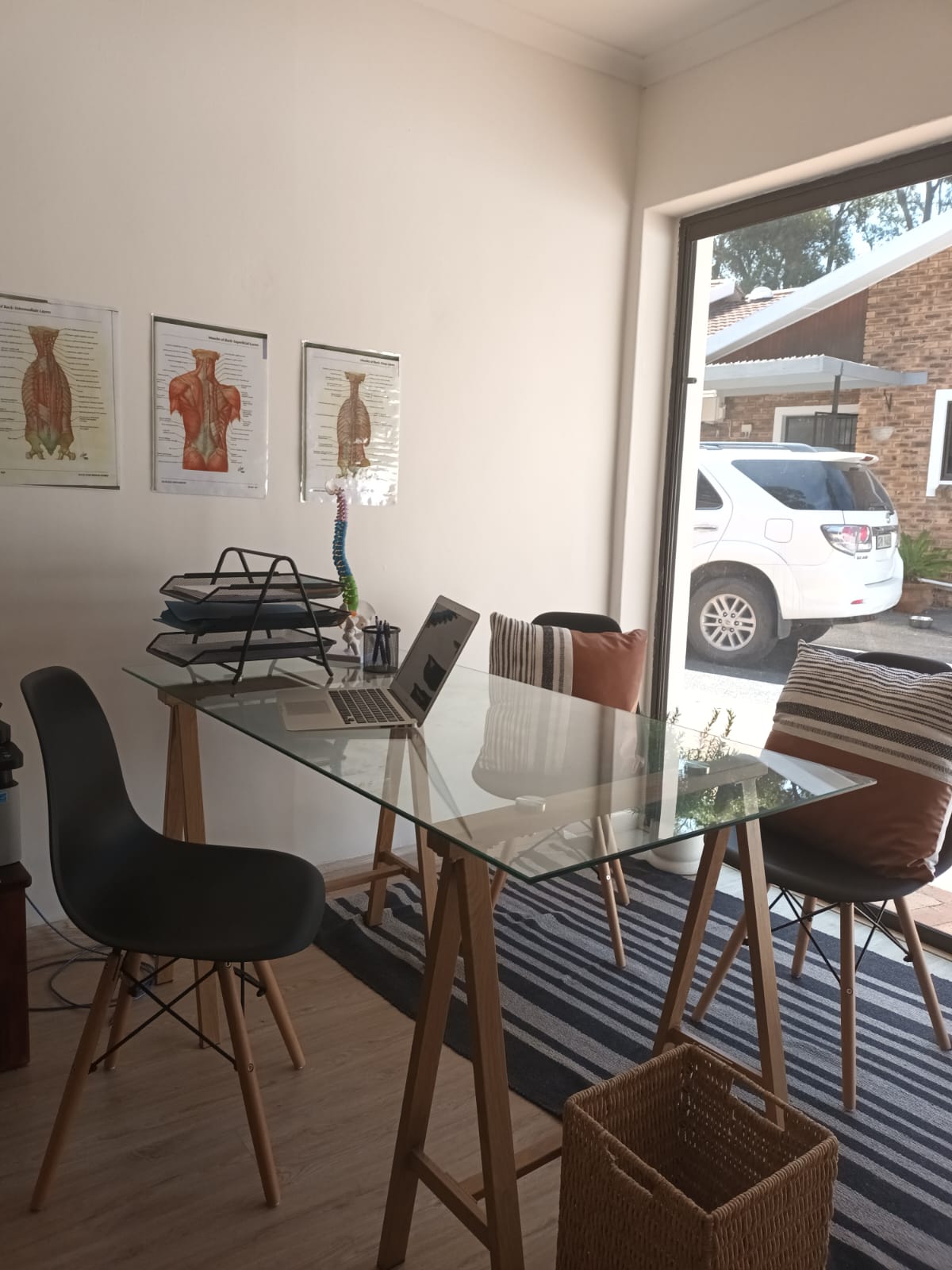 Studio seating area beside a bright window